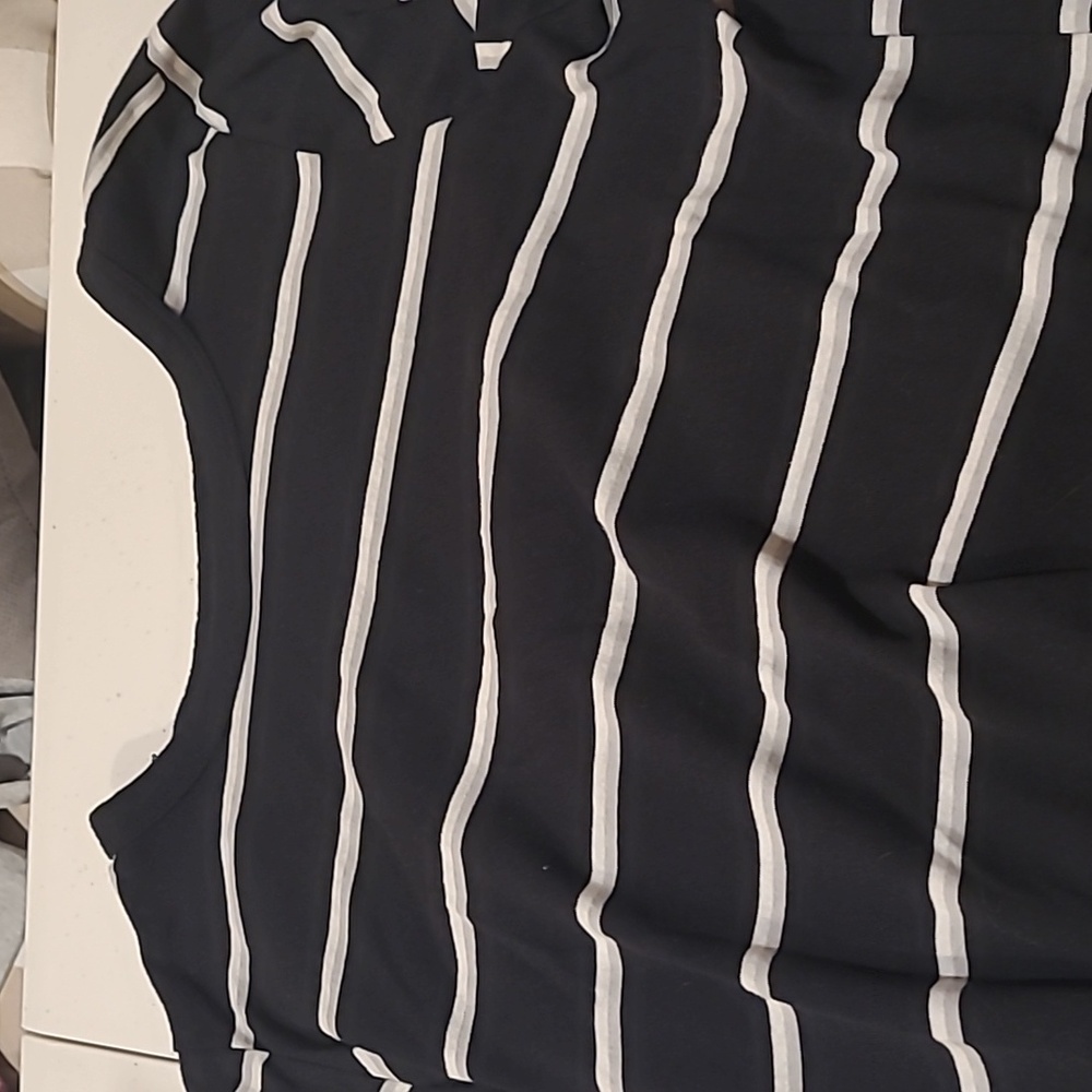 A kids black and white stripped shirt
